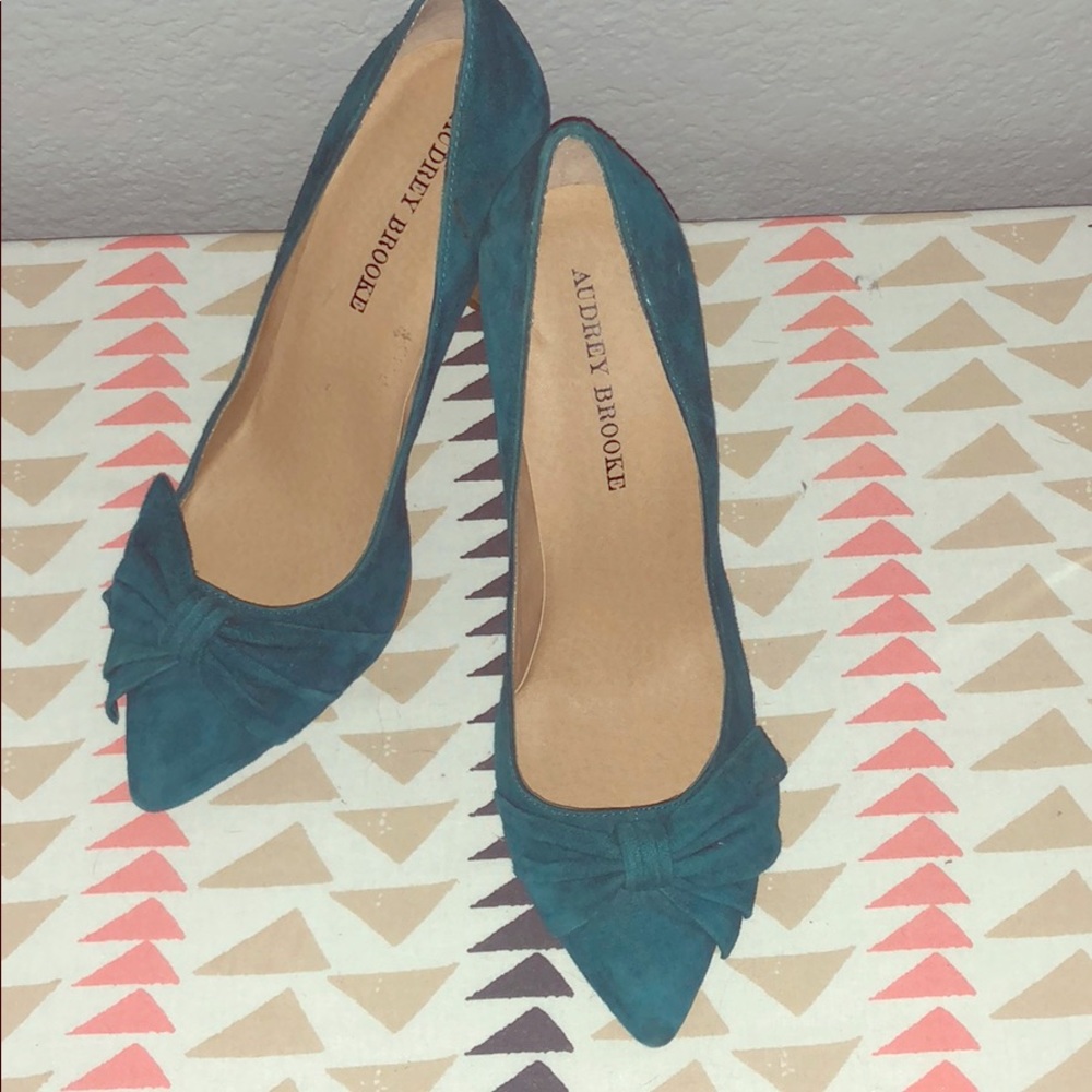 Audrey Brooke teal pumps with bow detail.